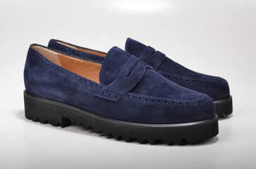 black and blue leather shoes.