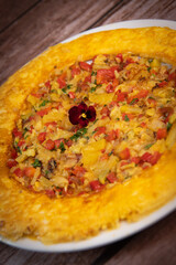 Recipe Omelette with peppers, onions, tomatoes, courgettes and coriander. High quality photo