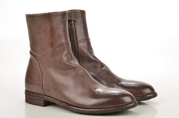 Brown boots isolated.