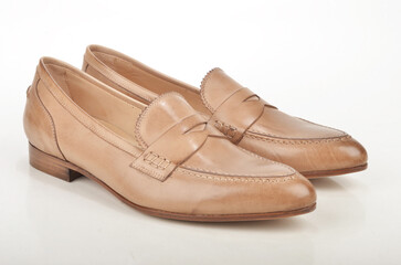 pair of brown leather shoes