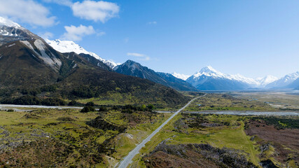 Beautiful day with Landscape view of mountain range near Aoraki Mount Cook and the road leading to Mount Cook Village in New zealand
