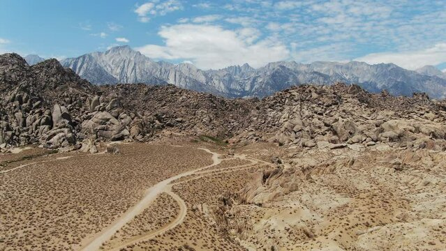 Mt Whitney from Alabama Hills Aerial Shot Rocky Canyon Wide Descend Eastern Sierra California USA