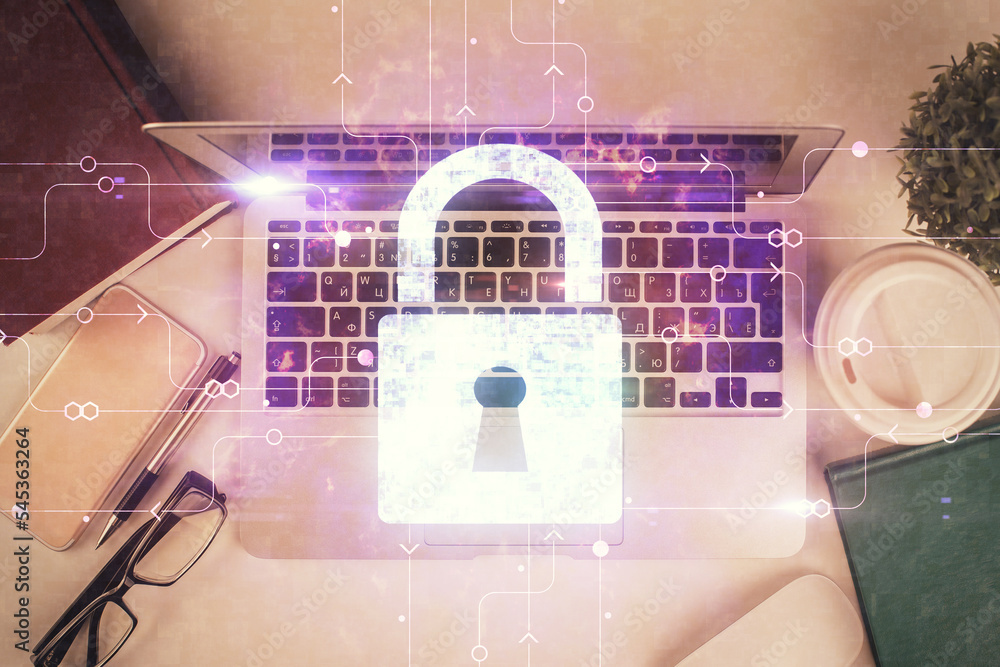 Poster Double exposure of lock hologram drawing over study table background with computer. Concept of data security. Top view.