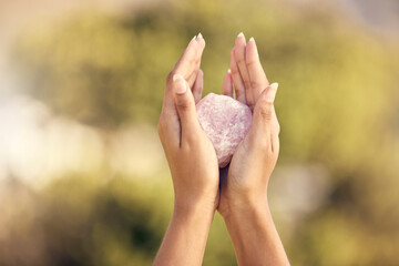 Woman, hands and rose quartz in nature for meditation or occult practice. Crystal, yoga stone or rock for relax, mindfulness and zen healing, spiritual growth and female spirit, chakra or awakening. - obrazy, fototapety, plakaty