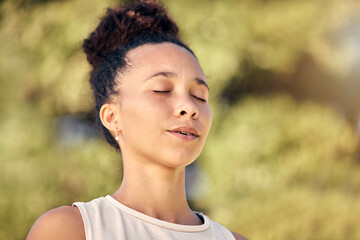 Calm, fitness and breathing woman in nature for outdoor wellness, running or workout exercise in summer. Young sports, athlete or runner girl breathe, meditation or thinking in forest, park or garden