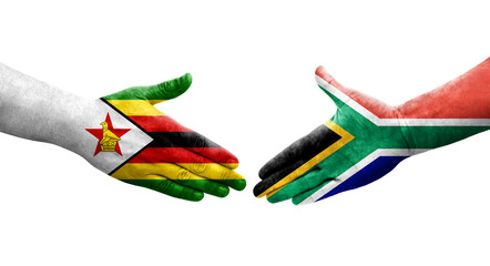 Handshake between South Africa and Zimbabwe flags painted on hands, isolated transparent image.