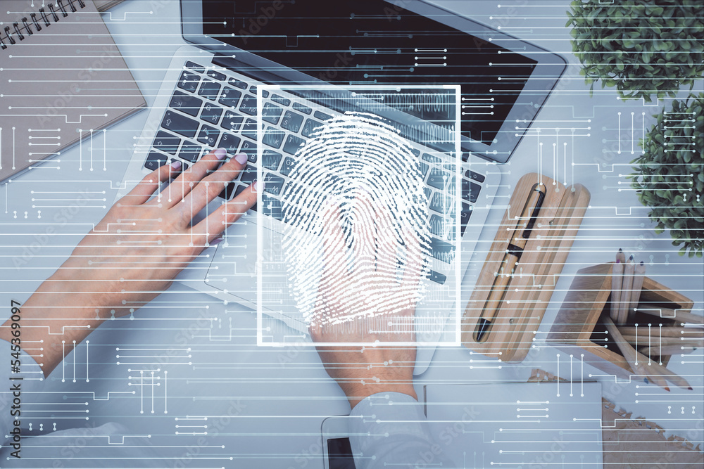 Poster Double exposure of woman hands working on computer and fingerprint hologram drawing. Top View. Digital Security concept.