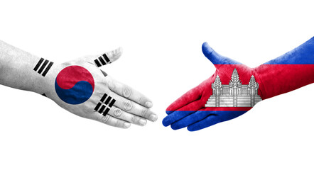 Handshake between South Korea and Cambodia flags painted on hands, isolated transparent image.