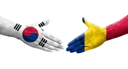 Handshake between South Korea and Chad flags painted on hands, isolated transparent image.