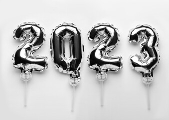 Figure 2023 made of balloons on light background