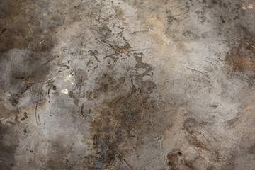 Grunge metal background or texture with scratches and cracks, close up, top view