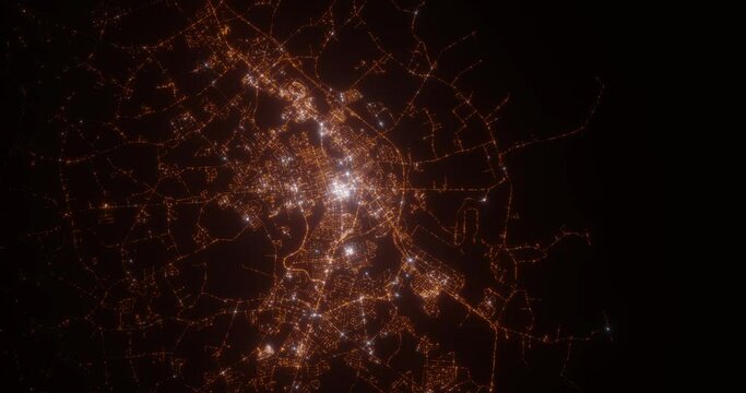 Dover (Delaware, USA) aerial view at night. Top view on modern city with glow effect. Camera is zooming out, rotating counterclockwise