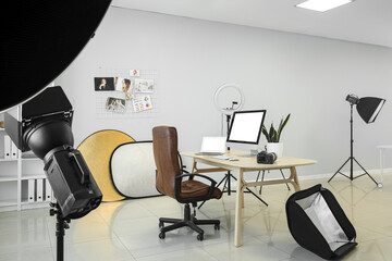 Photographer's workplace in interior of modern studio