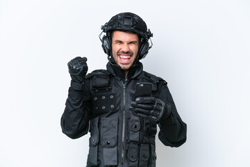 Young caucasian SWAT man isolated on white background with phone in victory position