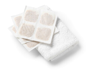 Mustard plasters with towel on white background