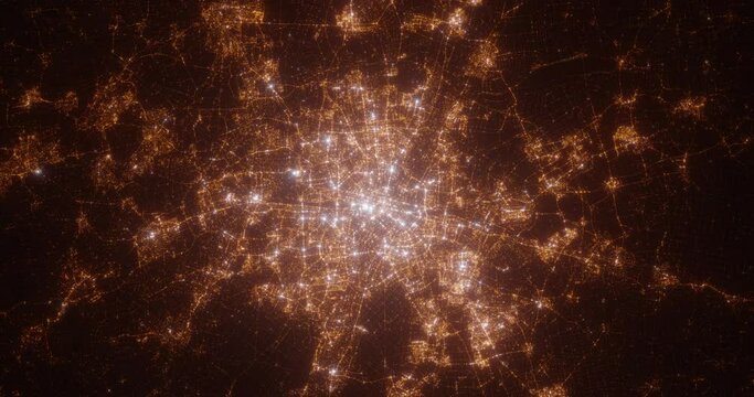 Munich (Germany) aerial view at night. Top view on modern city with glow effect. Camera is zooming out, rotating counterclockwise