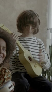 A group of kids playing music together in a band