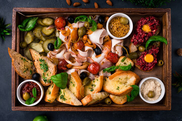 Russian snack for vodka lard, pork, cucumbers, tomatoes, mushrooms, olives, capers, French mustard,...