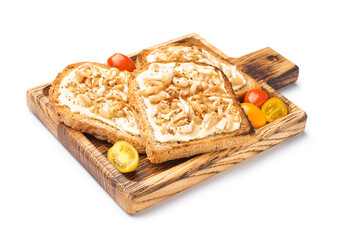 Wooden board of tasty toasts with cream cheese, mushrooms and tomatoes on white background