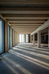 Fototapeta construction site of a Timber-concrete composite office building obraz