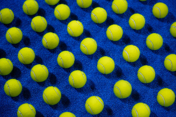 Combination of padel balls on the court