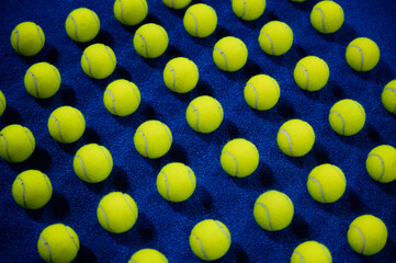 Combination of padel balls on the court