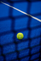 Padel ball behind the net