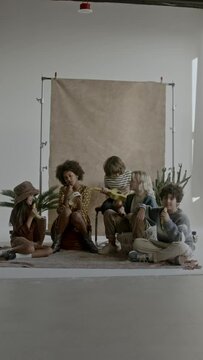 a group of children playing music together in a band