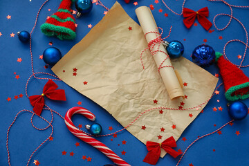 Composition with blank letter to Santa and Christmas decorations on blue background