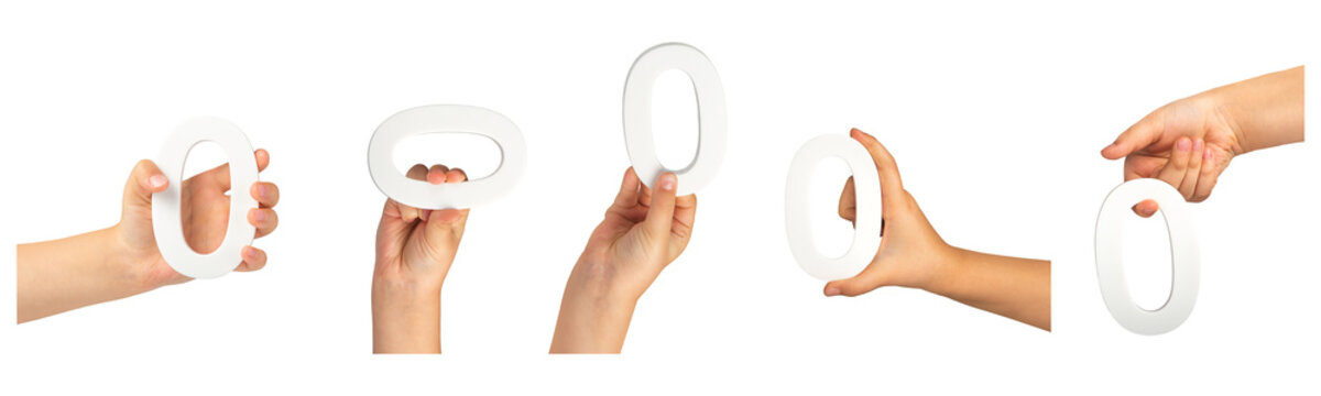 Zero in hand. Big set PNG. The number zero is clasped in a hand isolated on a black background. Number zero white in a child's hand on a black background
