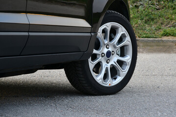 Tire and alloy wheel on this passenger car
