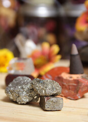 Incense Cone on Stone Slab With Crystals and Flowers
