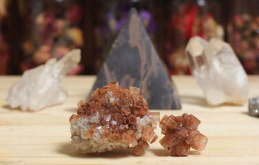 Aragonite Carbonate Crystals With Pyramid in Background