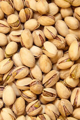 Pistachios texture and background. Pistachio nuts, top view, flat lay