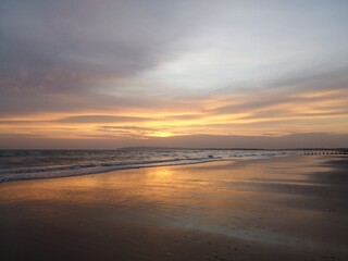 Fototapeta na wymiar sunset on the beach Camber Sands UK