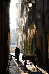 Naklejka na ściany i meble A narrow alley in Rome, Italy