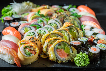 Fototapeta Delicious and healthy sushi set served with wasabi. obraz