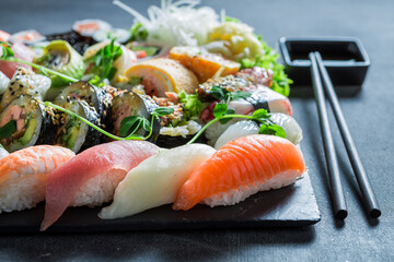 Aromatic na fresh sushi set made of seafood and vegetables.