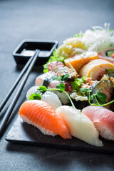 Tasty and fresh sushi set made of rice and shrimps.