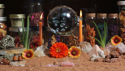 Crystal Ball With Candles and Chakra Stones on Australian Red Sand