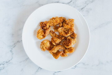 fried chicken skin isolated on white blackground