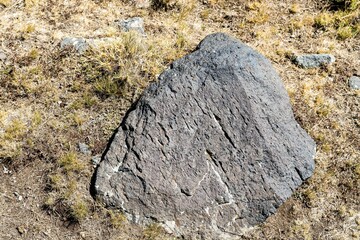 Large stone in the mountains of the Caucasus as a natural background.