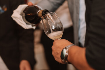 We open a bottle of white red or rosé sparkling wine and pour into glasses for a great friendship with wine lovers.