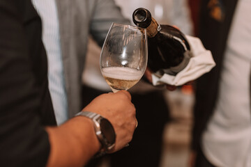 We open a bottle of white red or rosé sparkling wine and pour into glasses for a great friendship with wine lovers.