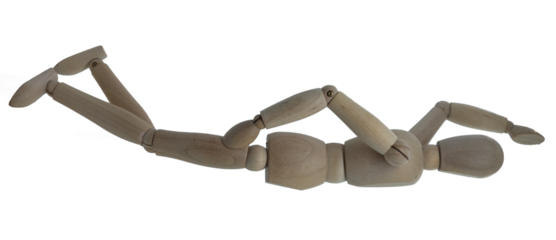Wooden figure in swimming crawl position