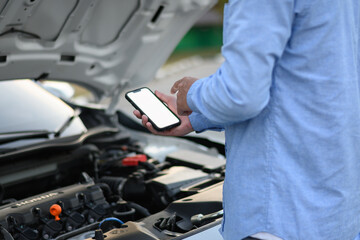Man calling to check engine on smartphone