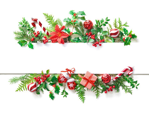 Christmas tree branches and decorations with blank card and space for text