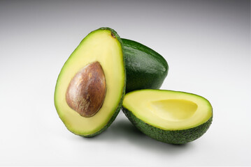 Still life shot of Two avocados on a white background
