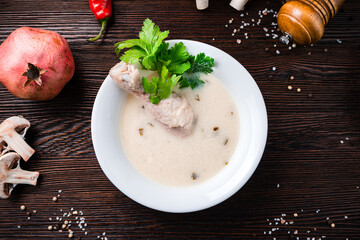 Traditional Georgian food chicken soup Chikhirtma with cilantro.