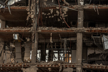 Old building being demolished to make room for new architecture. Construction Demolition Site. Destroyed building, can be used as demolition, earthquake, bomb, terrorist attack or natural disaster